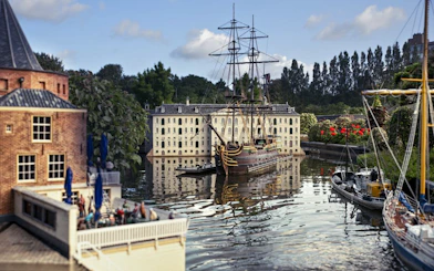 Miniature ship and buildings at Madurodam miniature park, Netherlands.