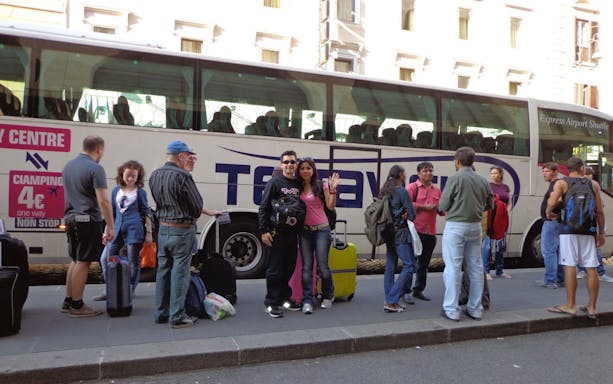 Tourists waiting for Istanbul Terravision airport transfer bus.