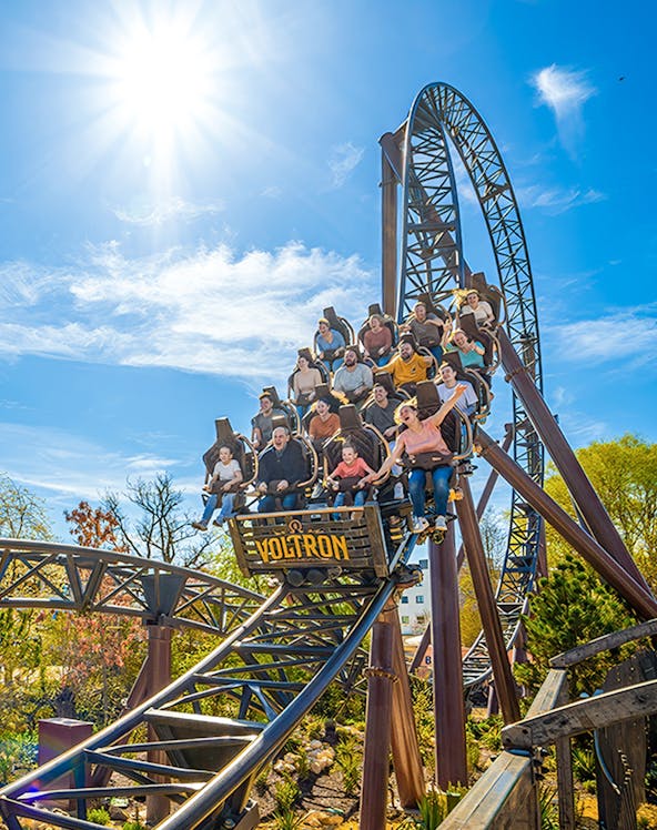 Voltron Nevera rollercoaster with riders at Europa Park's Croatia-themed area.