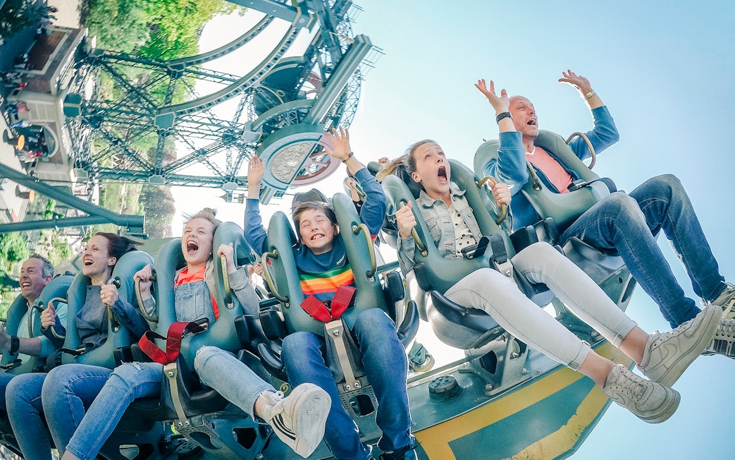 Guests enjoying a roller coaster ride at Efteling Theme Park.