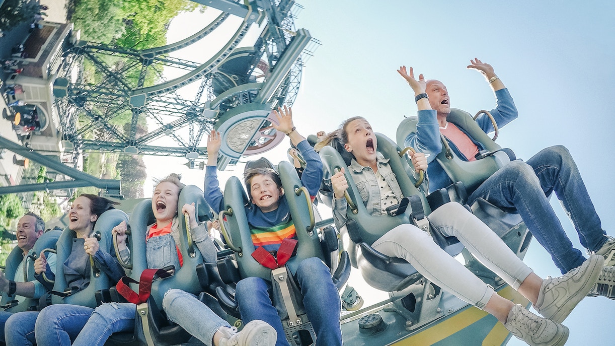 Guests enjoying a roller coaster ride at Efteling Theme Park.