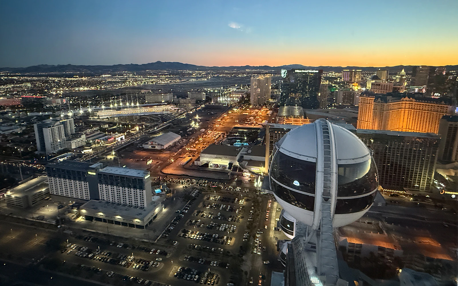 View of Las Vegas skyline from High Roller Gondola at sunset.
