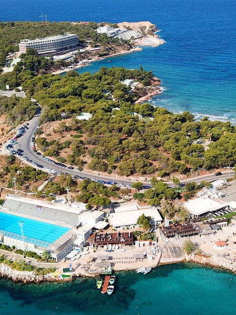 Aerial view of Athens coastline with beaches and marina on Hop on Hop off Classic Tour.