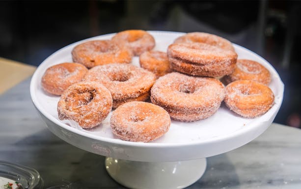 Donuts on a platter from a guided tasting tour in Boston.