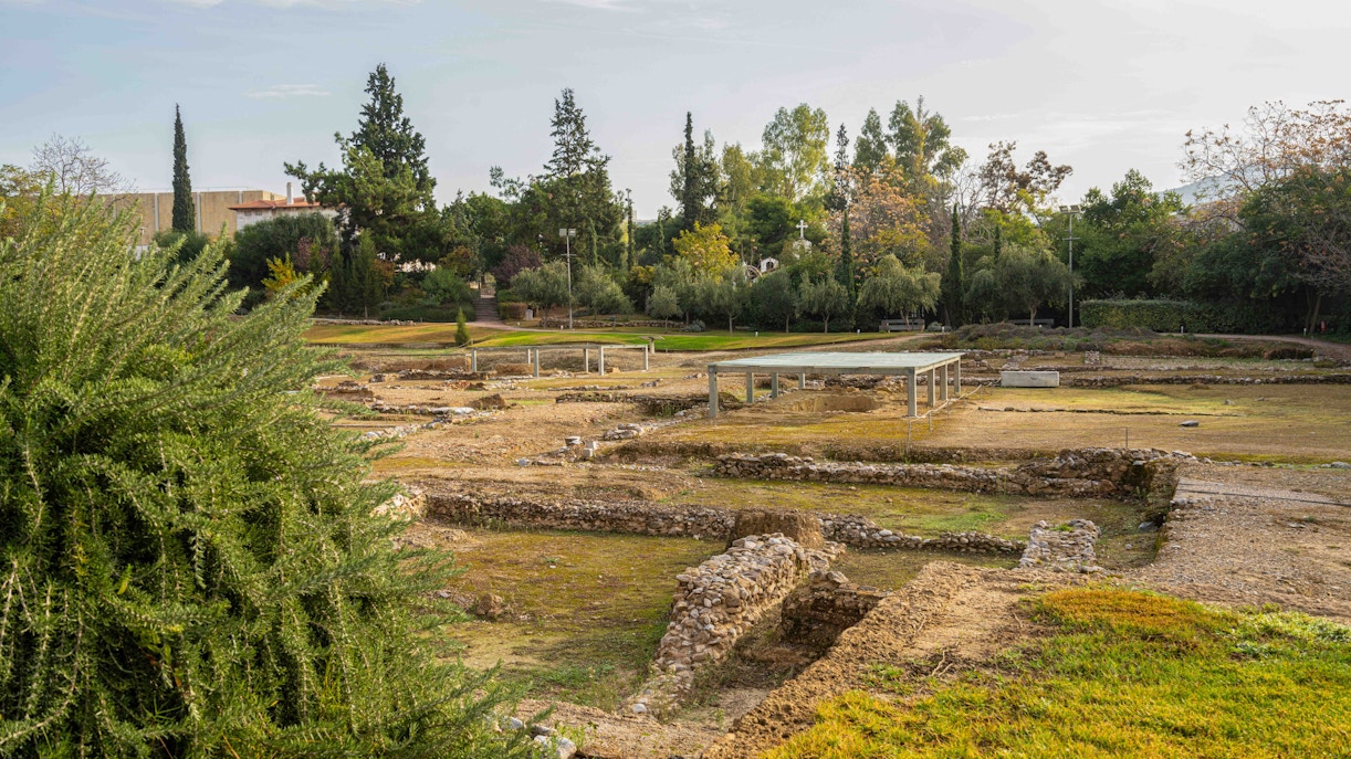 Archaeological site of Aristotle's Lyceum in Athens, Greece, with ancient ruins and pathways.