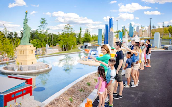 Guests viewing Lego Statue of Liberty at Legoland New York.