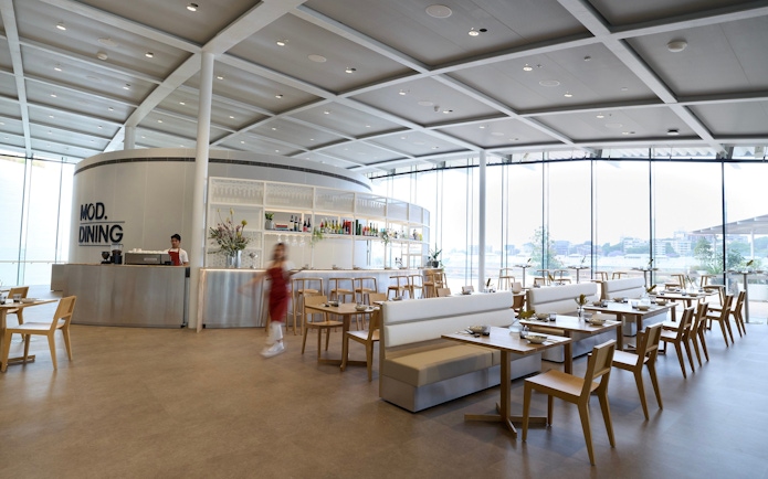 Dining area at Art Gallery of New South Wales, Sydney with modern seating and large windows.
