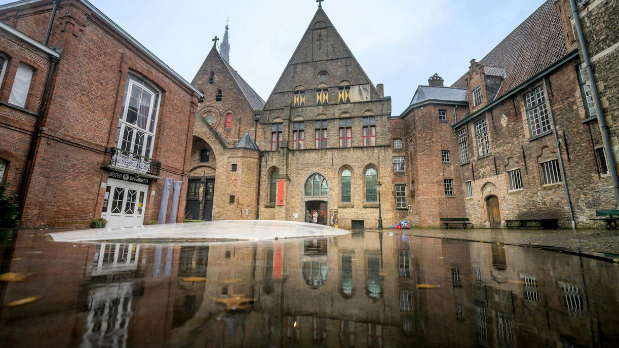 Museum Sint-Janshospitaal courtyard with historic brick architecture in Bruges, Belgium.