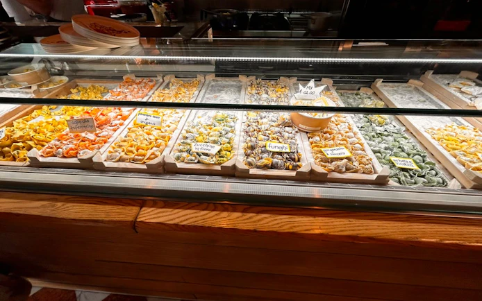 Assorted fresh pasta varieties displayed in a Verona shop for the Romeo & Juliet Food Tour.