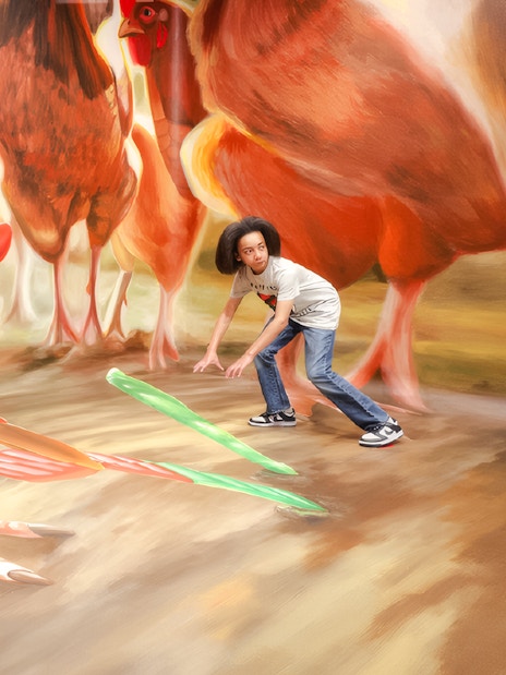 Guest interacting with giant chicken art at TiLT Interactive Museum, American Dream.