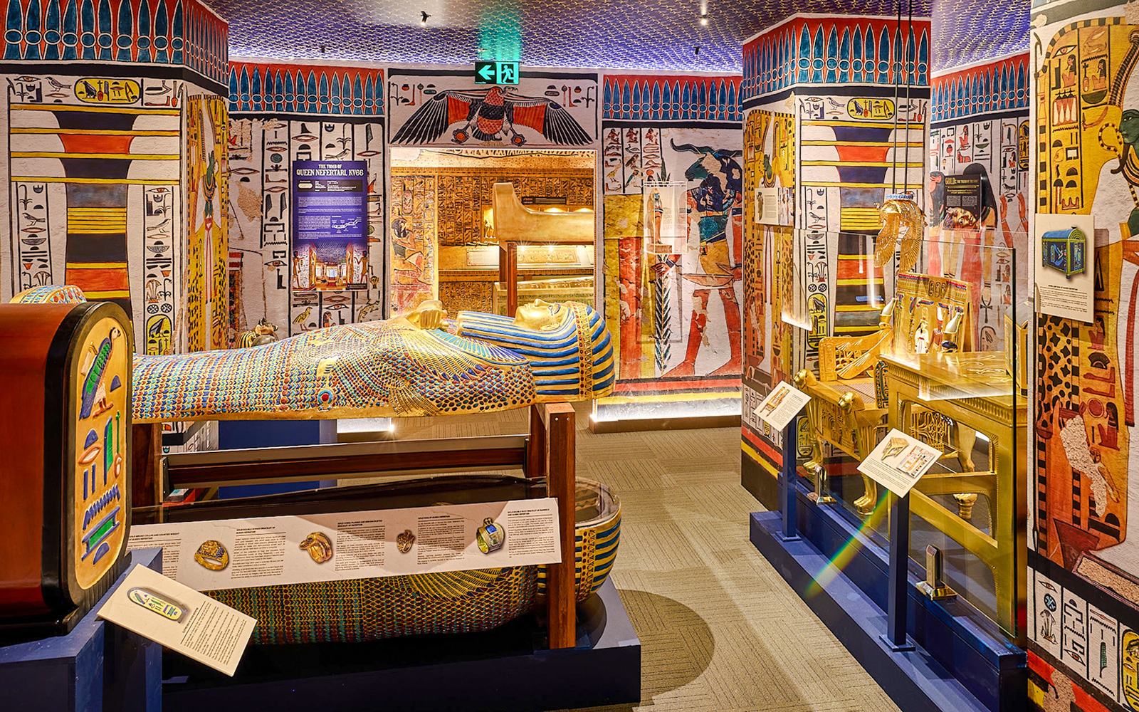 Sarcophagus and Egyptian artifacts displayed at the Tomb of the Pharaoh exhibit.