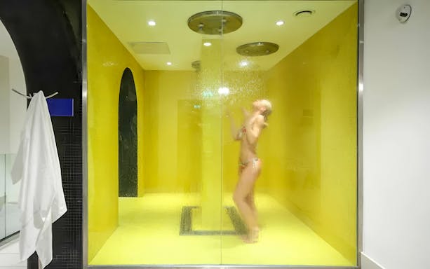 Person enjoying a steam shower at Dandar Spa.