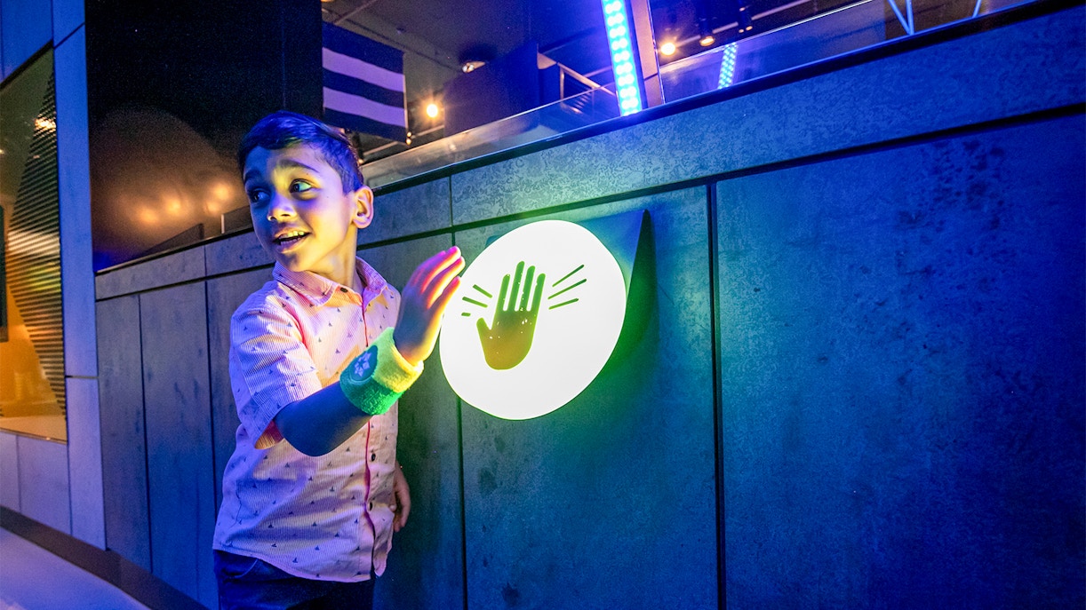 Melbourne Cricket Ground exterior with guided tour group.