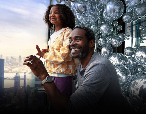 Visitors engaging with interactive displays at SUMMIT One Vanderbilt, New York City.