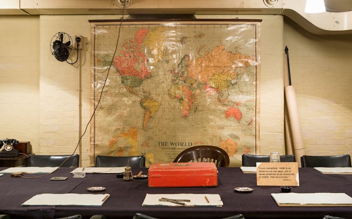 Meeting room with world map in Churchill War Rooms, London.