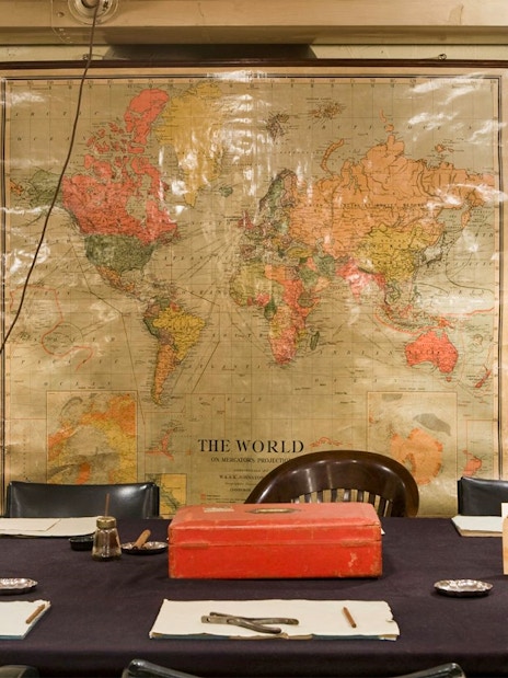 Meeting room with world map in Churchill War Rooms, London.