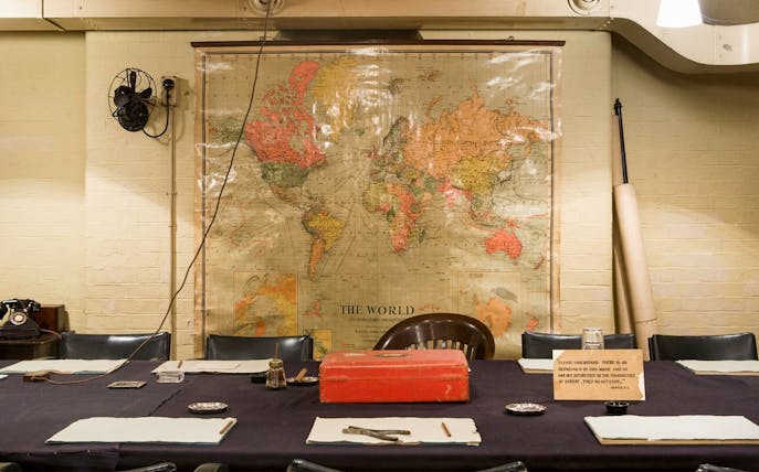 Meeting room with world map in Churchill War Rooms, London.