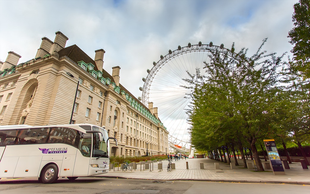 London Eye and County Hall near tour bus on Magic of London Tour.