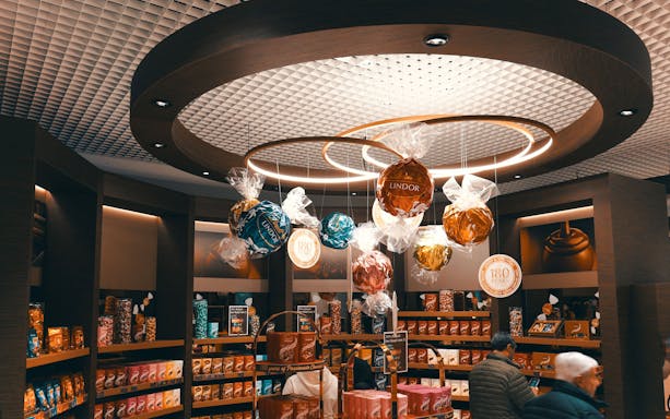Lindt Chocolate Museum display with large Lindor truffles and chocolate products.