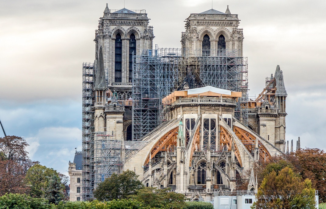 Notre Dame Cathedral restoration work with scaffolding visible after fire, Paris, France.