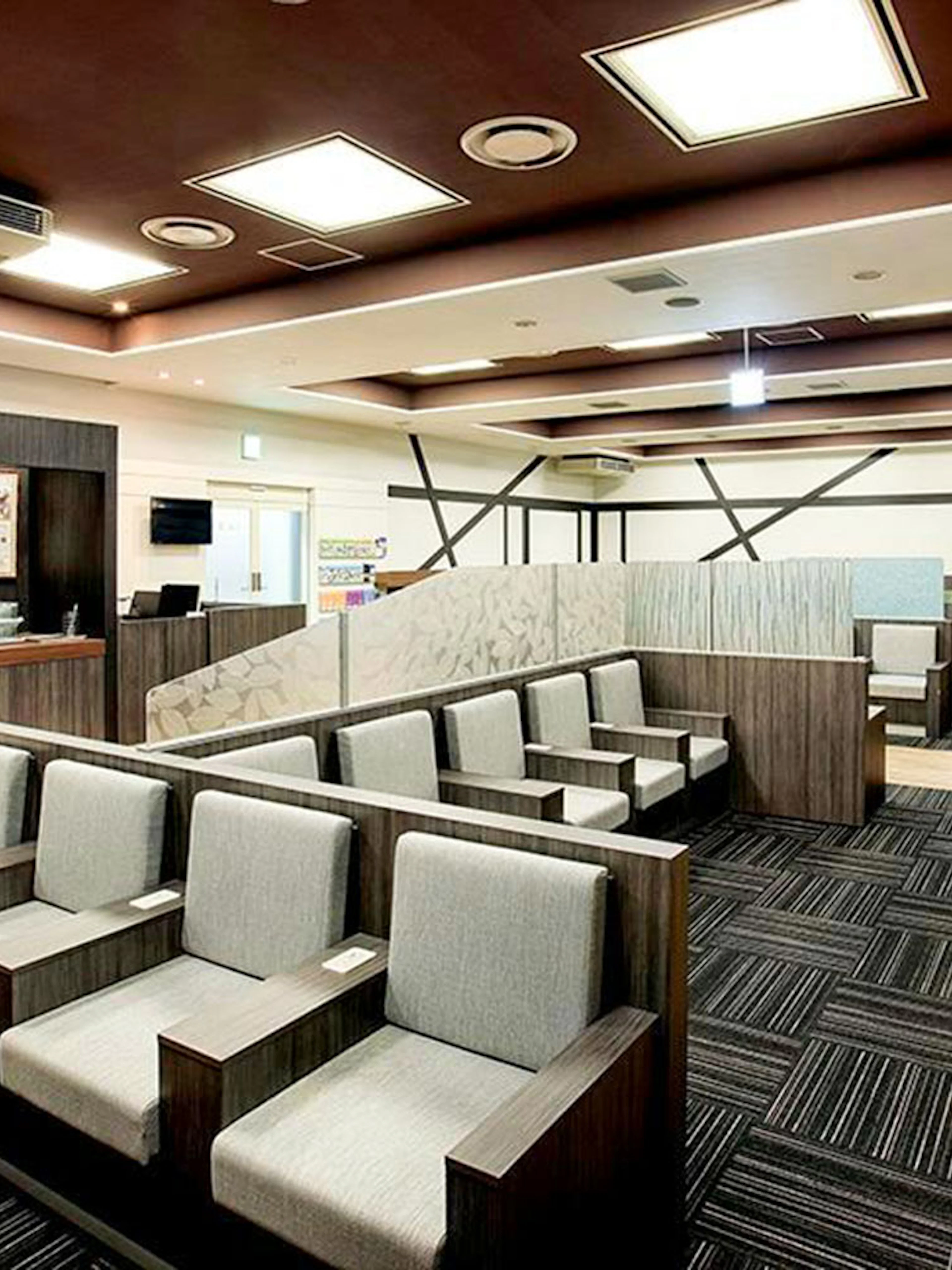Waiting area seating at Narita International Airport Terminal 1 lounge.