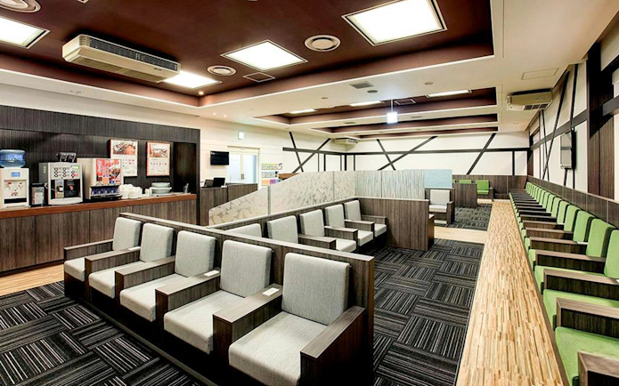 Waiting area seating at Narita International Airport Terminal 1 lounge.