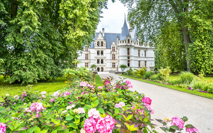 Château of Azay-le-Rideau with gardens and pathway in Loire Valley, France.