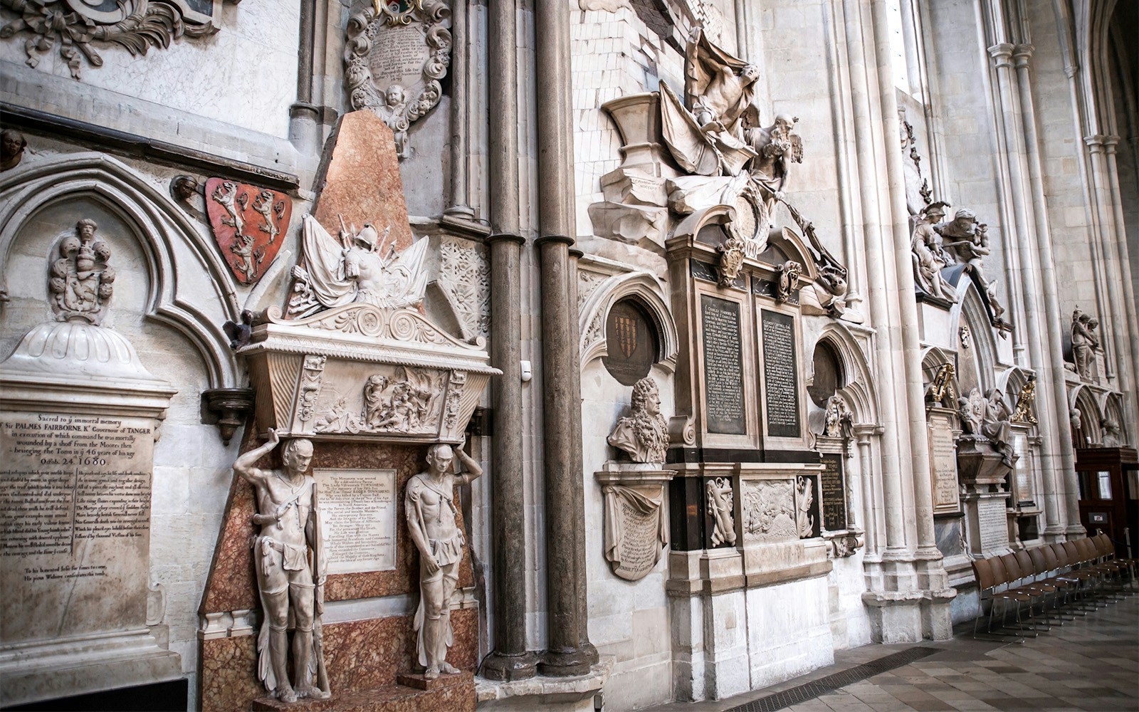 Westminster Abbey Poets' Corner with intricate memorials and sculptures.