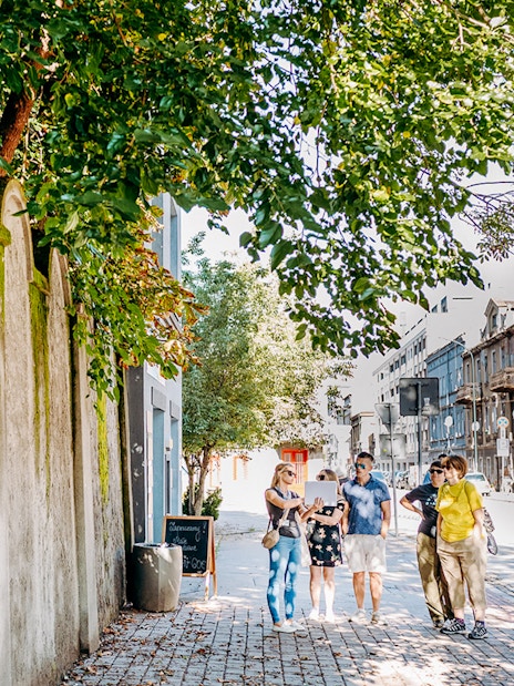 Tour group exploring Oskar Schindler’s Factory area in Krakow.