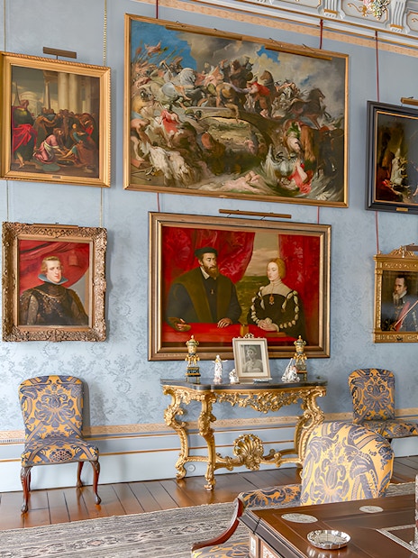 Art-filled room in Liria Palace with ornate furniture and historical paintings.