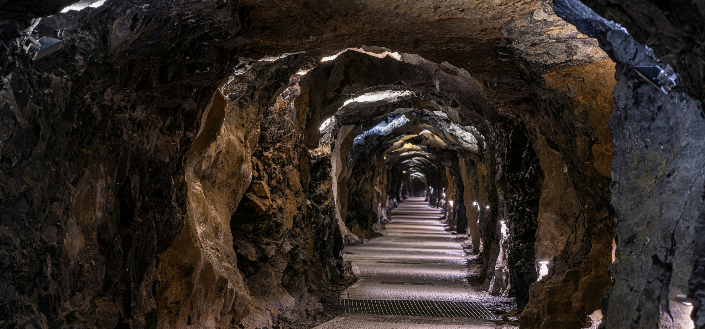 Exploring limestone formations inside Aillwee Caves, Ireland.