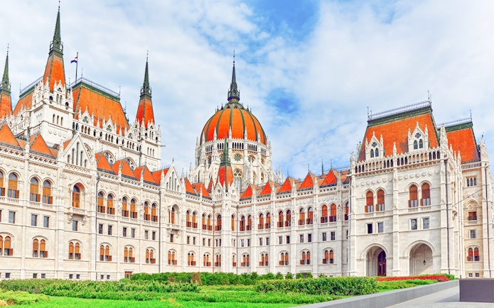 Hungarian Parliament courtyard with red roofs and dome, Budapest.