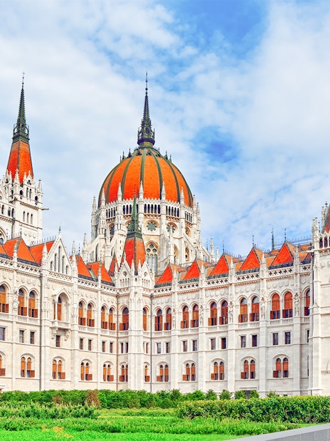 Hungarian Parliament courtyard with red roofs and dome, Budapest.