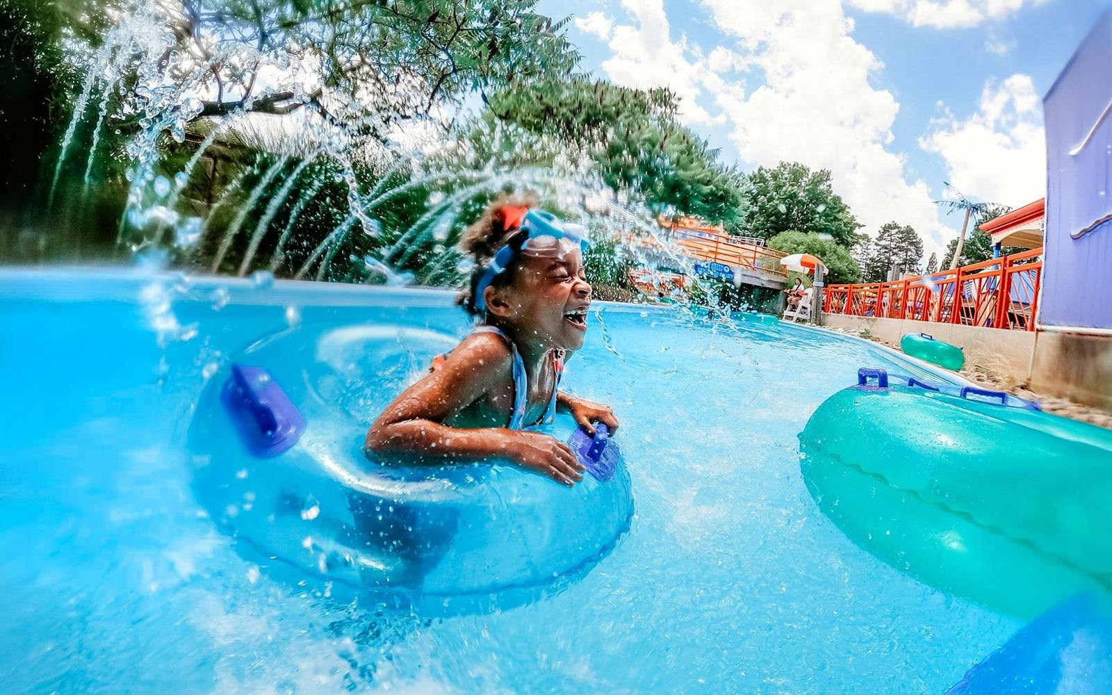 Child enjoying water ride at Sesame Place Philadelphia.