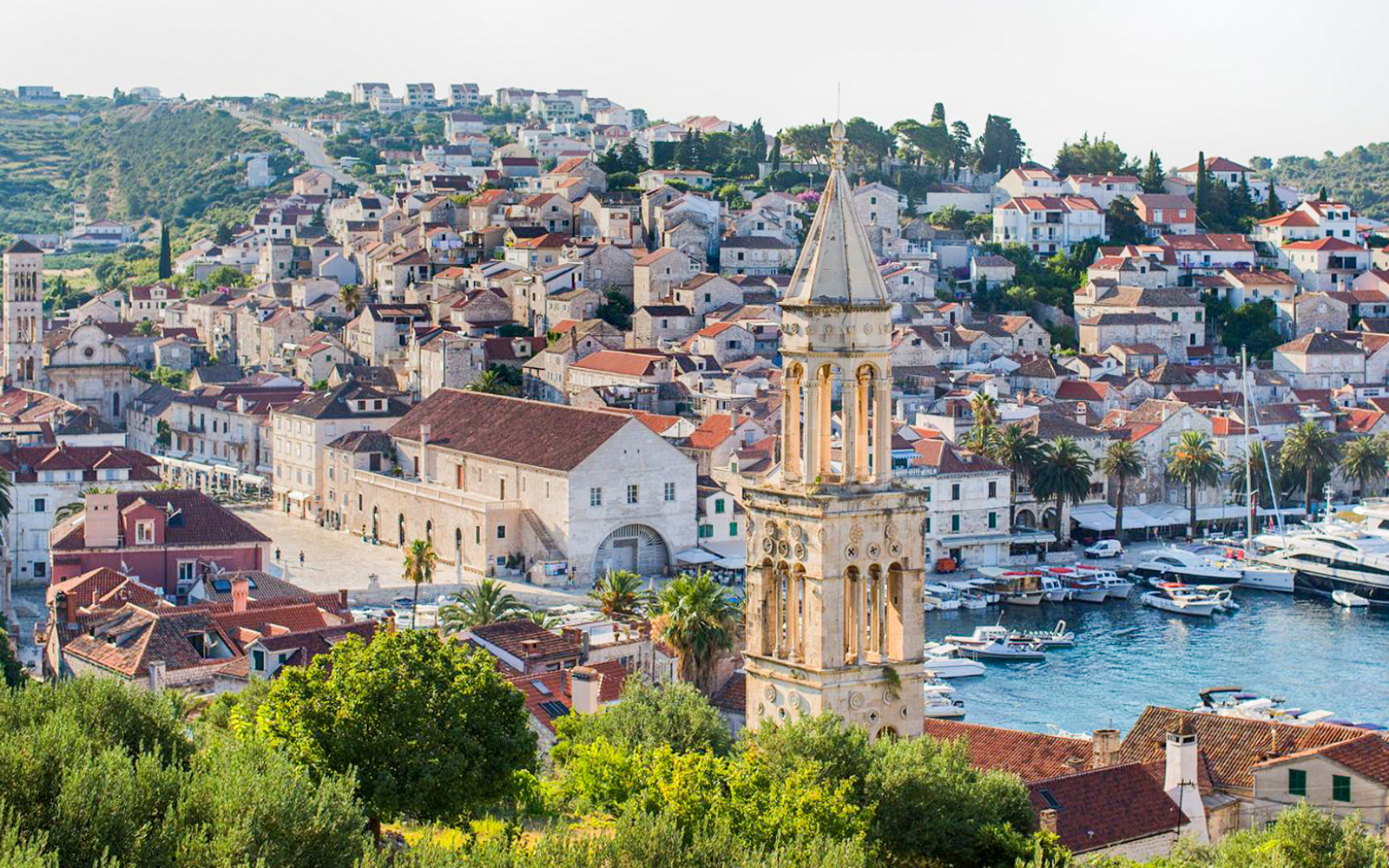 Town of Hvar with historic bell tower and harbor view.