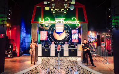 Guests exploring wax figures at Madame Tussauds Nashville.