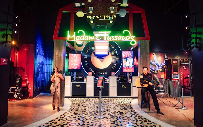 Guests exploring wax figures at Madame Tussauds Nashville.