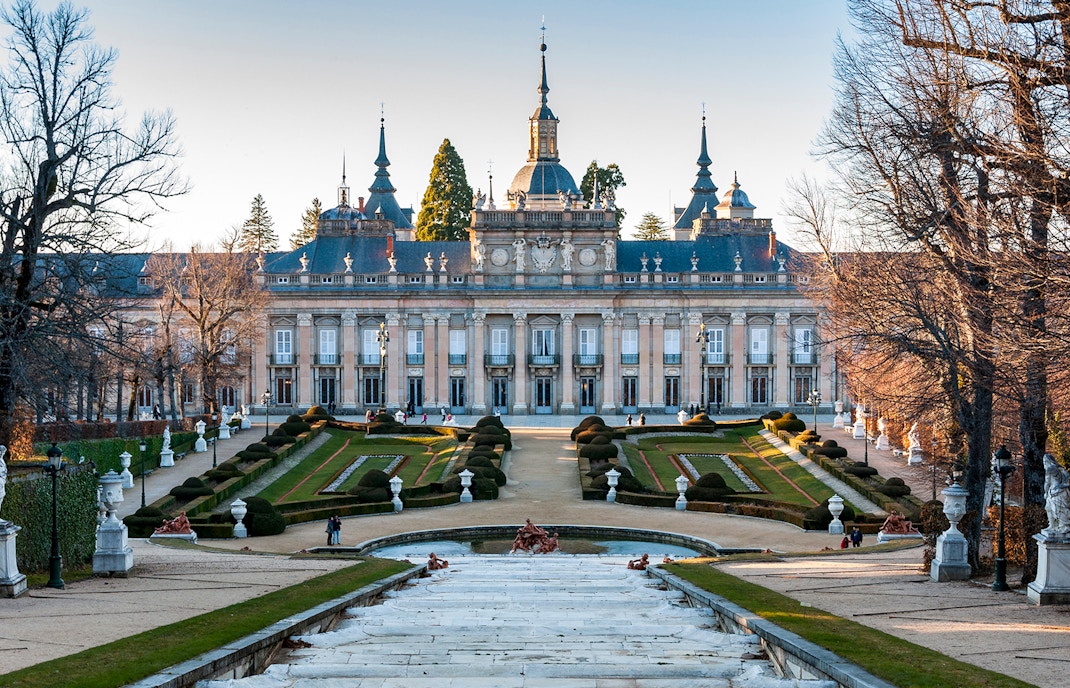 Royal Palace of Madrid designed by Giambattista Sacchetti with ornate architecture and lush gardens.