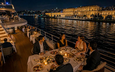 Dinner cruise on the Bosphorus with view of Çırağan Palace, Istanbul.