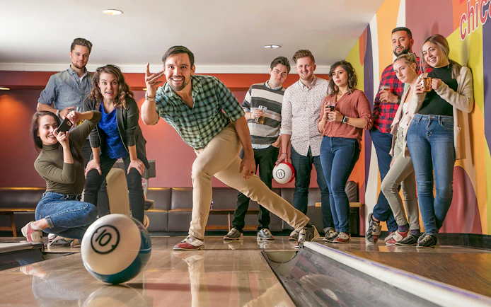 Group enjoying a bowling game in Chicago.