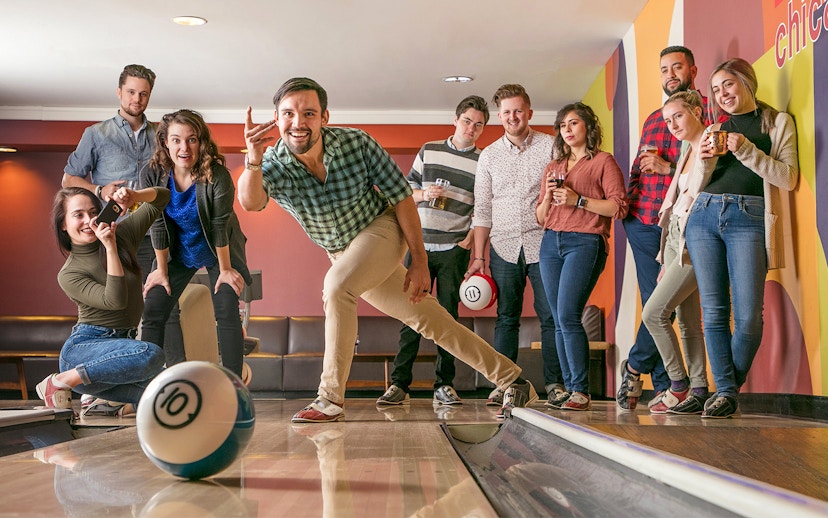 Group enjoying a bowling game in Chicago.