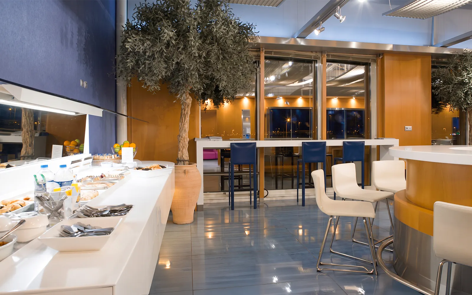 Skyserv Melina Merkouri Lounge seating and buffet at Athens International Airport Hall B.