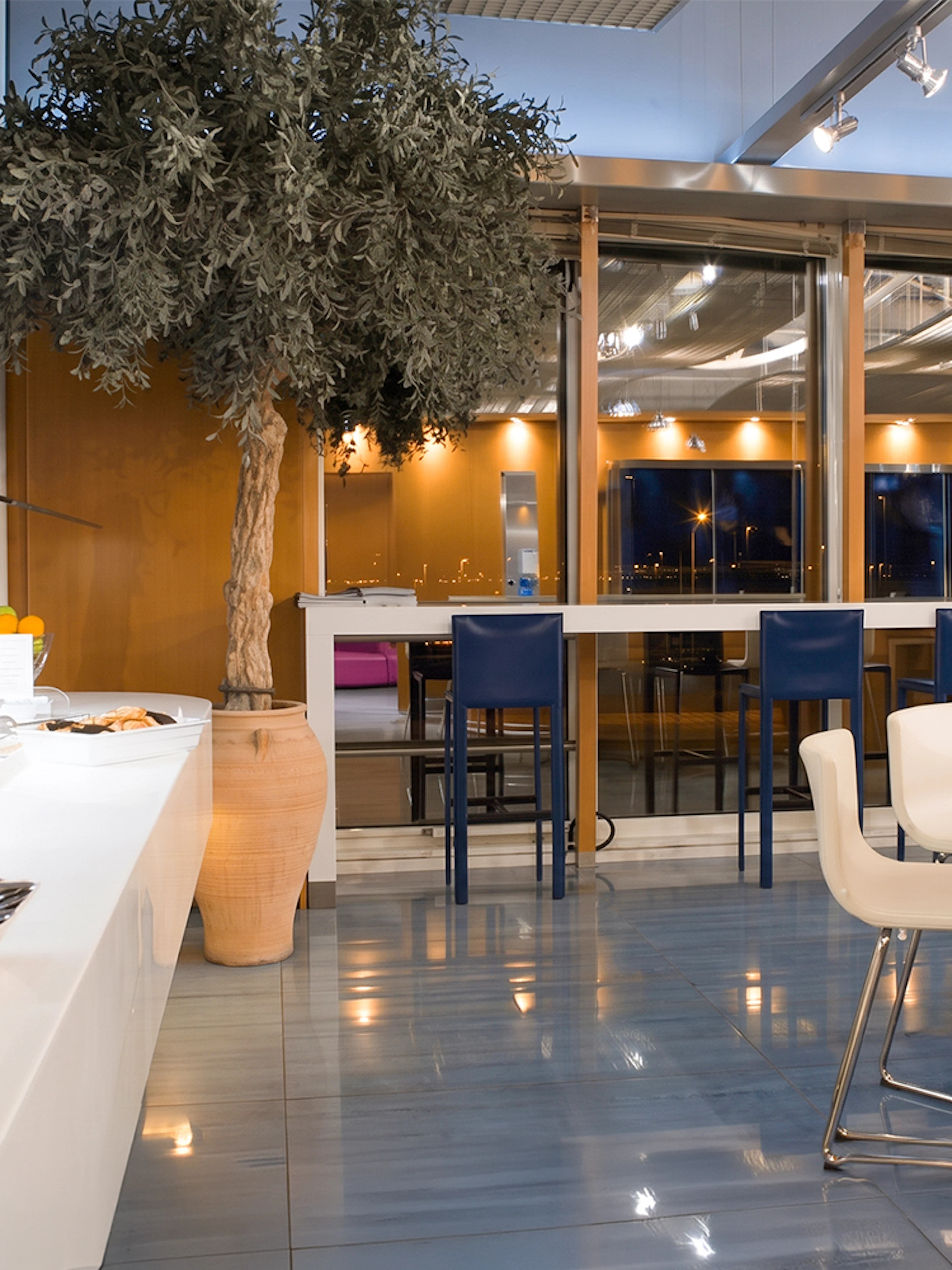 Skyserv Melina Merkouri Lounge seating and buffet at Athens International Airport Hall B.
