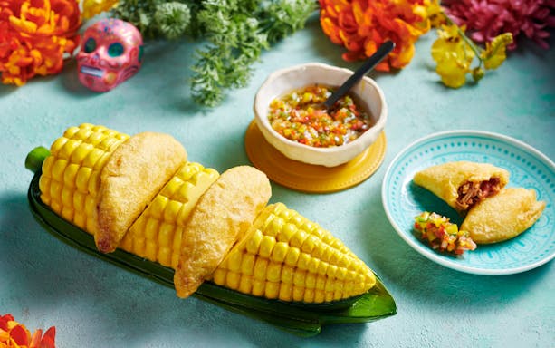 Empanadas with salsa and corn display at En Fuego Fiesta Mexicana Saturday Brunch, Dubai.