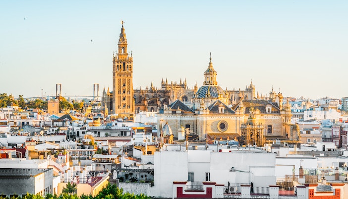 Seville Cathedral exterior with Gothic architecture in Seville, Andalusia, Spain.