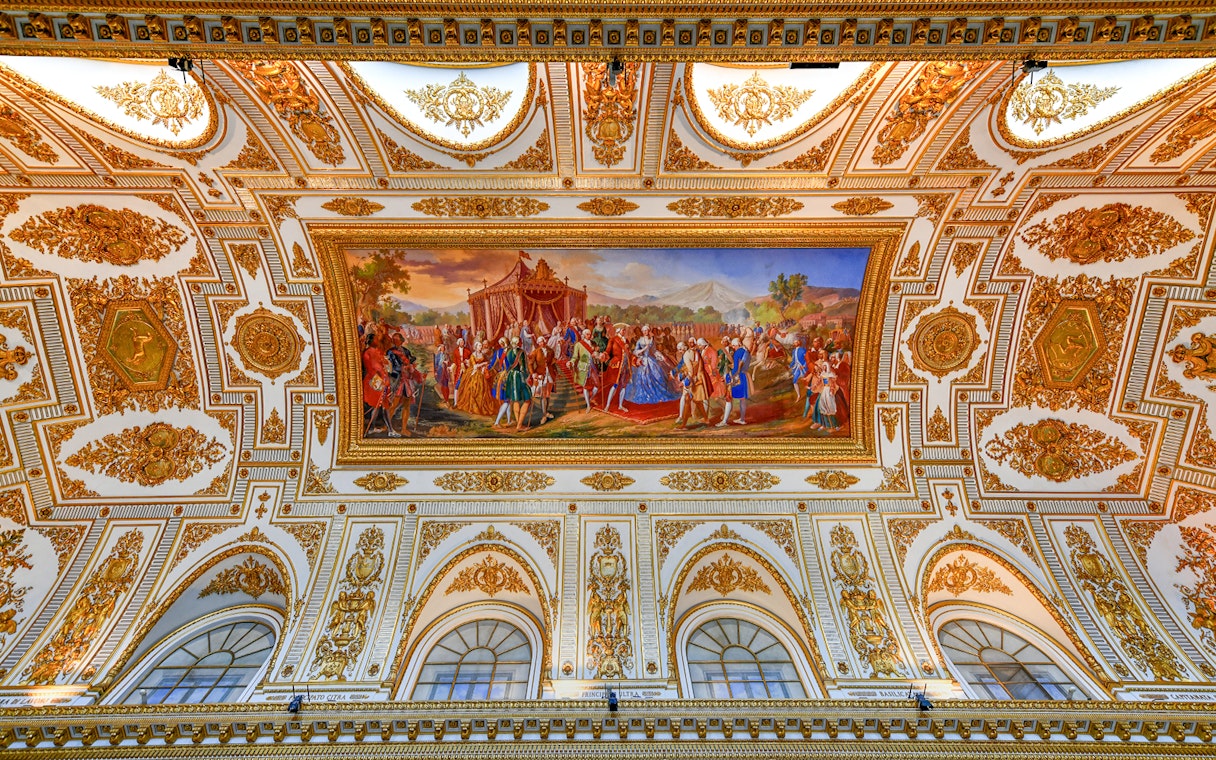 Ceiling fresco and ornate decorations at the Royal Palace of Caserta, Italy.