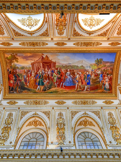 Ceiling fresco and ornate decorations at the Royal Palace of Caserta, Italy.