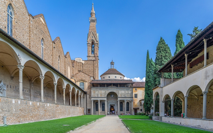 Pazzi Chapel courtyard with arched colonnades and central dome in Florence, Italy.