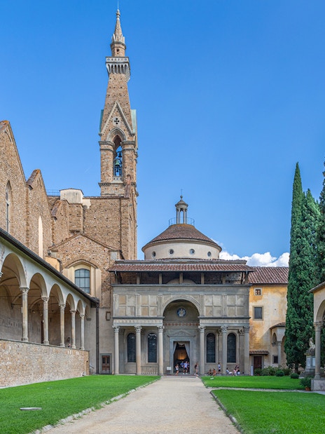 Pazzi Chapel courtyard with arched colonnades and central dome in Florence, Italy.