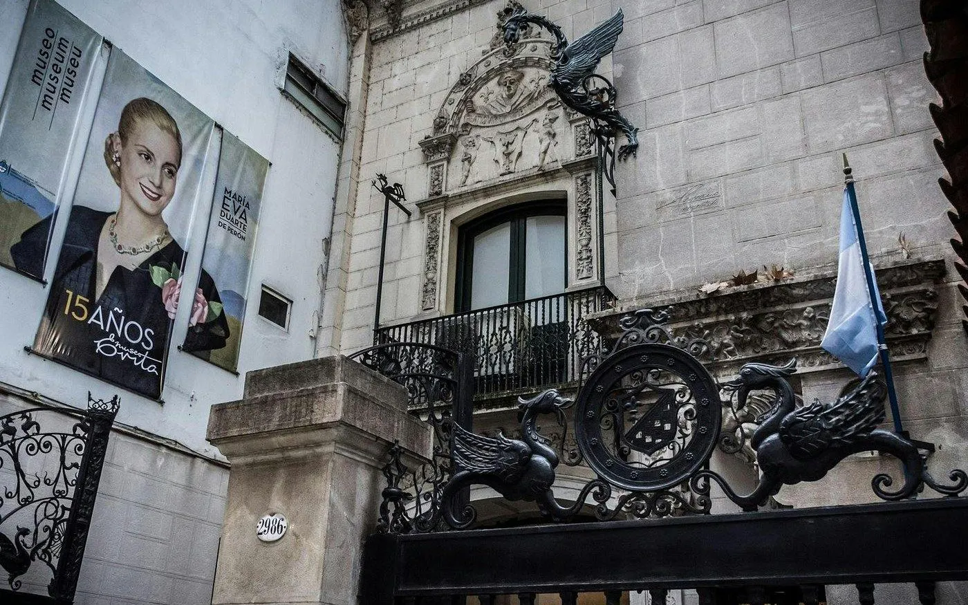Museo Evita entrance with decorative gate and Eva Perón banner in Buenos Aires, Argentina.